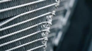 how do the fins help in radiator — close-up of finned radiator core