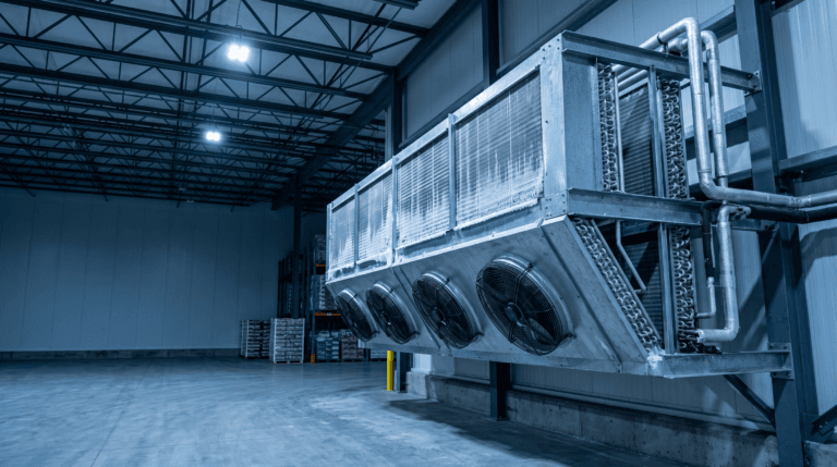 Large industrial refrigeration unit in a warehouse setting.