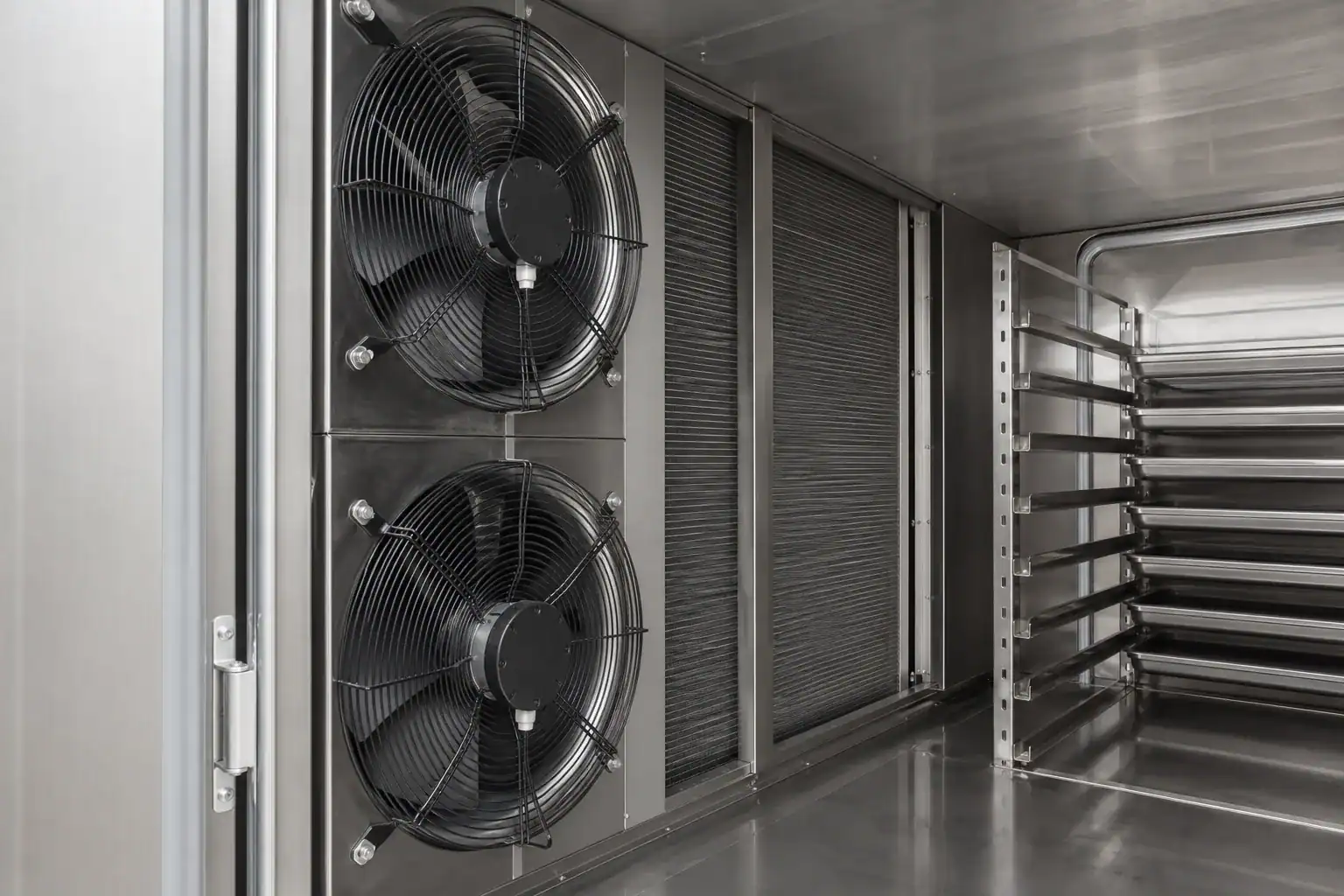 Industrial refrigeration system with large fans and cooling panels.