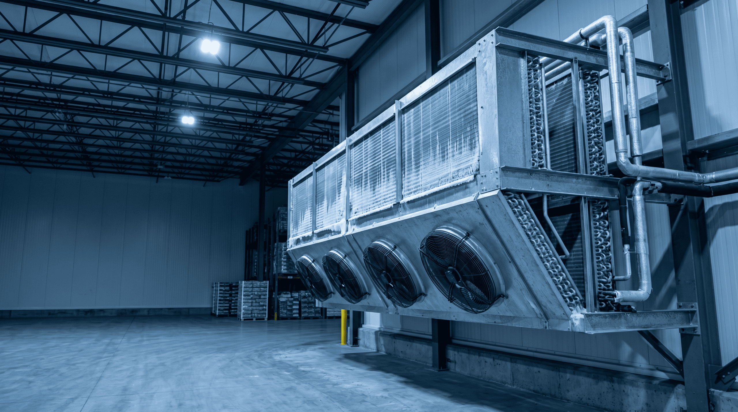 Industrial refrigeration system in a warehouse for commercial cooling needs.